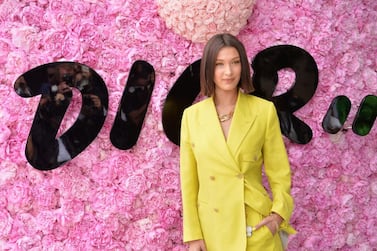 Bella Hadid has fronted Dior Makeup campaigns since she was signed on by the beauty brand in 2017. She's pictured here at a Dior event in Paris last year. Photo: Getty 