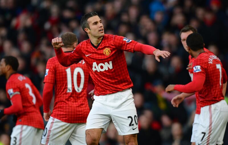 Manchester United's Dutch forward Robin van Persie (2-R) celebrates after scoring the first goal during the English Premier League football match between Manchester United and Sunderland at Old Trafford in Manchester, north-west England on December 15, 2012. AFP PHOTO/ANDREW YATES

RESTRICTED TO EDITORIAL USE. No use with unauthorized audio, video, data, fixture lists, club/league logos or “live” services. Online in-match use limited to 45 images, no video emulation. No use in betting, games or single club/league/player publications (Photo by ANDREW YATES / AFP)