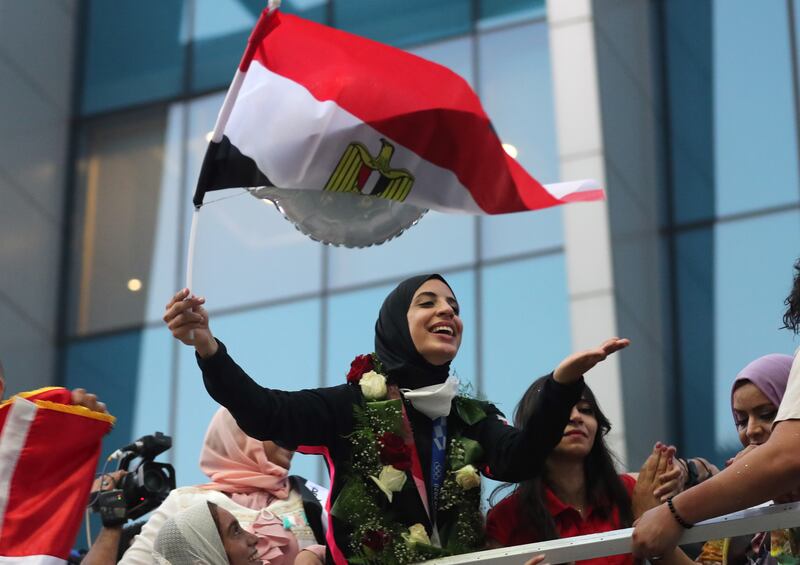 A warm welcome for Feryal Abdelaziz, the first Egyptian woman to win an Olympic gold medal, at Cairo International Airport. EPA