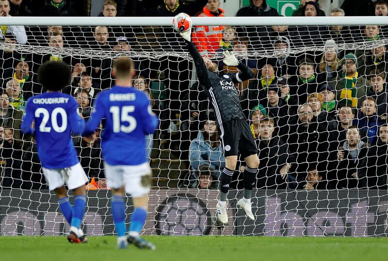 Leicester goalkeeper Kasper Schmeichel makes a save at Carrow Road. Reuters