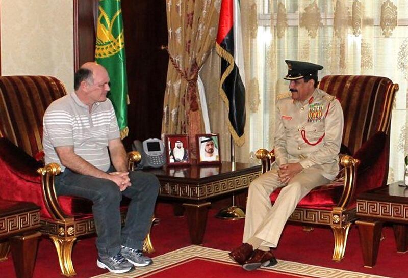 Richard Mark Barber visits Maj Gen Khamis Al Mazeena, Dubai Police chief, to thank police for their efforts and the care he received after he was stabbed by a burglar at his home. Courtesy Dubai Police Department