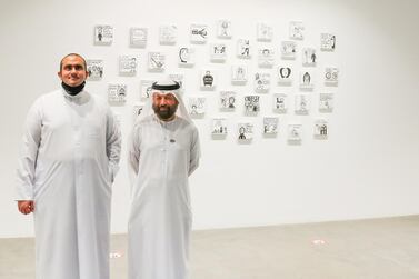 Abdullah Lutfi, left, with fellow Emirati artist Abdulqader Al Rais at the opening of his show at Cuadro Gallery in DIFC. Courtesy Cuadro Gallery