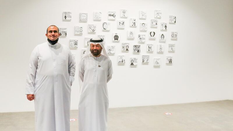 Abdullah Lutfi, left, with fellow Emirati artist Abdulqader Al Rais at the opening of his show at Cuadro Gallery in DIFC. Courtesy Cuadro Gallery