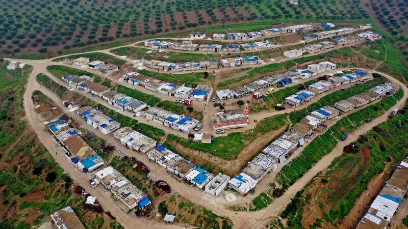 A drone image shows the Battia camp for displaced people near the village Azmarin, in Syria's northwestern Idlib province, bordering Turkey. AFP
