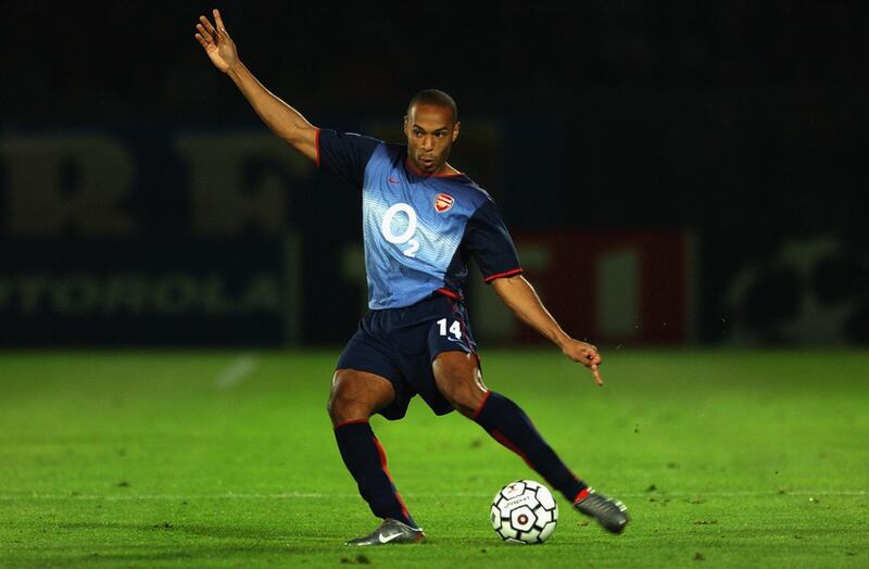 AUXERRE - OCTOBER 2 :  Thierry Henry of Arsenal in action during the UEFA Champions League First Phase Group A match between AJ Auxerre and Arsenal at The Abbe Deschamps in Auxerre, France on October 2, 2002. (Photo By Shaun Botterill/Getty Images) Arsenal won the match 1-0.
