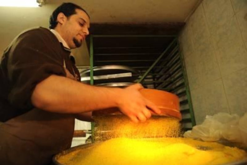 Rami Jedan, the head baker of Arafat Sweets bakery in Nablus on January 25, 2011.
Arafat Sweets in Nablus specializing in Kunafa pastry, and have many branches around the Middle East.
Photo by Ilan Mizrahi for The National

Hold for Foreign
