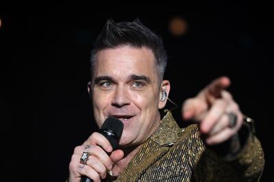 Robbie Williams played his biggest hits at a New Year's Eve gala dinner show at Atlantis, The Palm, Dubai. Chris Whiteoak / The National