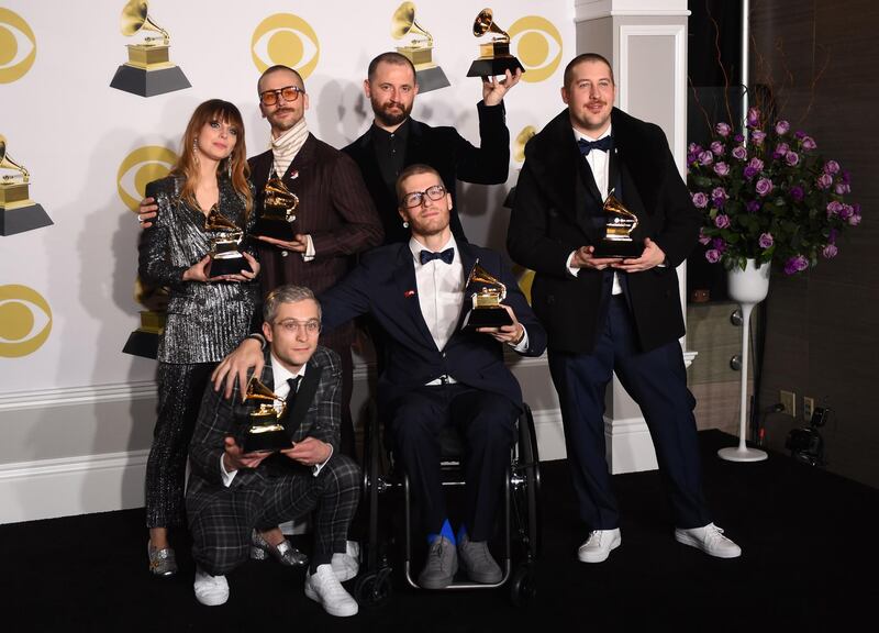 Zoe Manville, John Gourley, Jason Wade Sechrist, and Zachary Scott Carothers, Kyle O'Quin, and Eric Howk of musical group Portugal. The Man, winners of the Best Pop Duo/Group Performance award for 'Feel It Still'. AFP