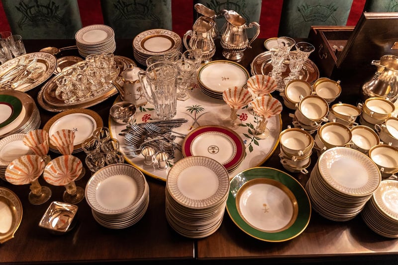 Prince Sultan Bin Fahad collected dishware that would have been used in the Red Palace when it hosted royal dignitaries, and used this same crockery for a feast held in honour of the staff who would have worked there. Image courtesy of Athr and the artist