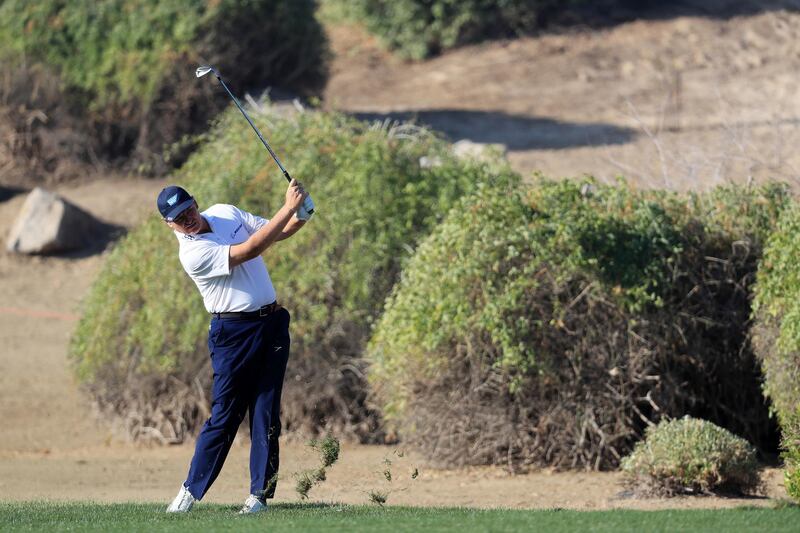 Ernie Els of South Africa plays his second shot on the 13th hole. Matthew Lewis / Getty Images