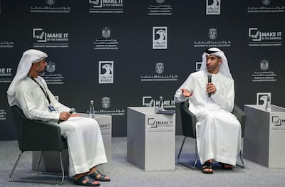 Nayef Shahin, director, innovation and knowledge at Abu Dhabi Department of Economic Development, and Dr Thani Al Zeyoudi, Minister of State for Foreign Trade, during a panel discussion at Make it in the Emirates forum.  Khushnum Bhandari / The National