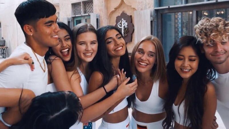 Fourth from left, Lebanese singer and dancer Nour ArdakanI stars in Now United's new video 'Habibi'. Instagram.