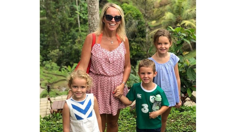 Orla Carbery pictured with her children Conor, Niamh and Aoife on holiday in Bali before the earthquake struck. Courtesy Orla Carbery