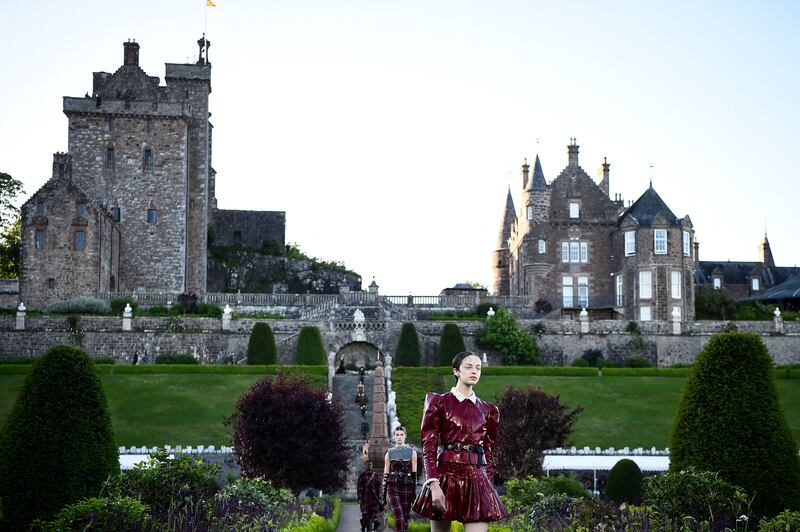 A model presents a creation for Dior during the 2025 Dior Croisiere (Cruise) fashion show on June 3, 2024 at Drummond Castle, in Crieff, in Scotland.  (Photo by ANDY BUCHANAN  /  AFP)