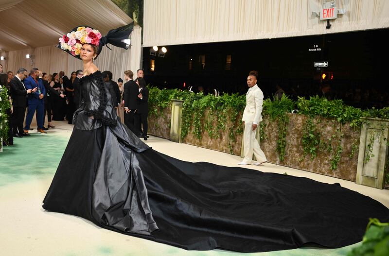 Zendaya's second dress is vintage John Galliano for Givenchy, with a Philip Treacy for Alexander McQueen hat. AFP 