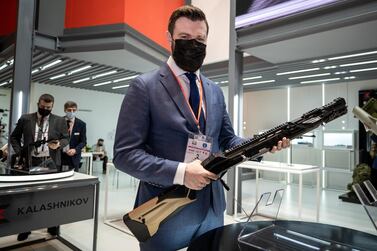 Dmitri Tarasov, chief executive of the Kalashnikov Group, with the MP-155 Ultima, 12-gauge semi-automatic shotgun. Victor Besa / The National. 