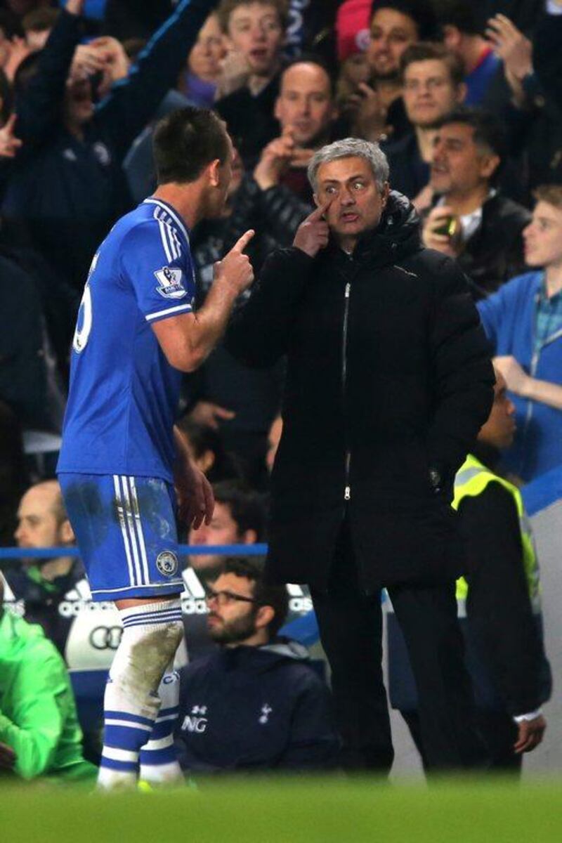 Chelsea manager Jose Mourinho exchanges words with John Terry the Chelsea captain during their Premier League match against Tottenham Hotspur at Stamford Bridge on March 8, 2014 in London, England. Clive Rose/Getty Images