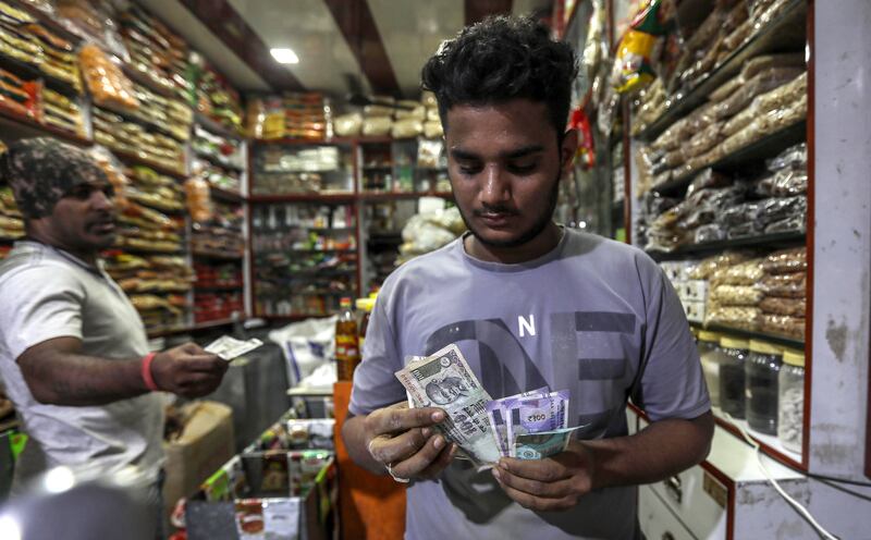 The Indian rupee is set to track the broad rise in the dollar after Fed officials, once again, adopted a hawkish tone. EPA