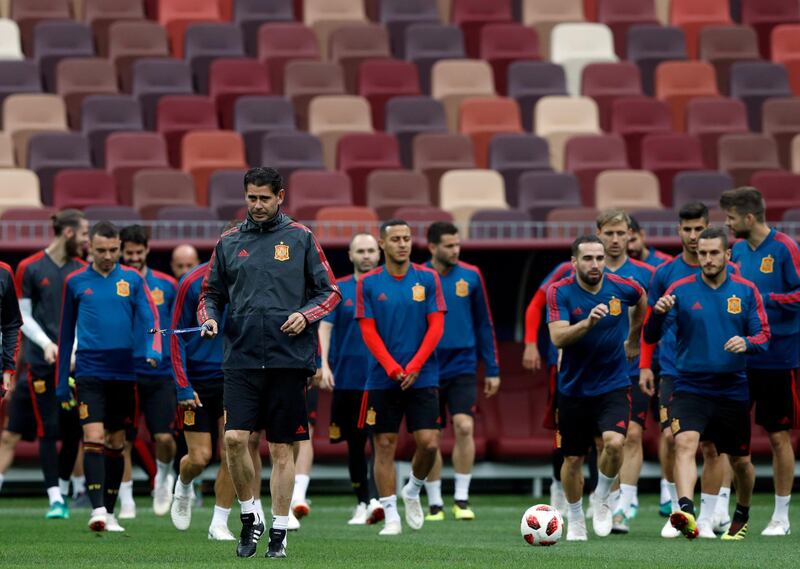 Spain head coach Fernando Hierro, center left, takes part during Spain's official training ahead of the round of 16 match between Russia and Spain at the 2018 soccer World Cup at the Luzhniki Stadium in Moscow, Russia, Saturday, June 30, 2018. (AP Photo/Manu Fernandez)