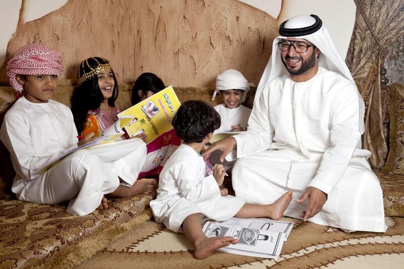 Saeed Ibrahim Al Mansoori with his children. Razan Alzayani / The National