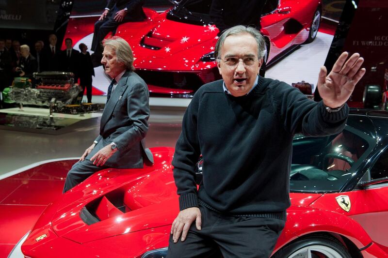 epa06909262 (FILE) - Ferrari CEO Luca Cordero di Montezemolo (L) with Sergio Marchionne (R), CEO Fiat Spa, pose on a Ferrari car during the media day at the 83rd Geneva International Motor Show in Geneva, Switzerland, 05 March 2013 (reissued 25 July 2018). According to reports, Marchionne died on 25 July 2018 in a Zurich hospital following a surgery and suffering complications.  EPA/SANDRO CAMPARDO *** Local Caption *** 50738015