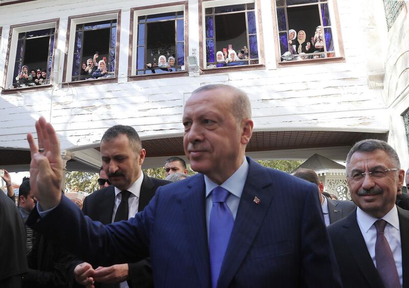 Turkish President Recep Tayyip Erdogan salutes supporters after Friday prayers, in Istanbul, Nov. 8, 2019. ( Presidential Press Service via AP, Pool )