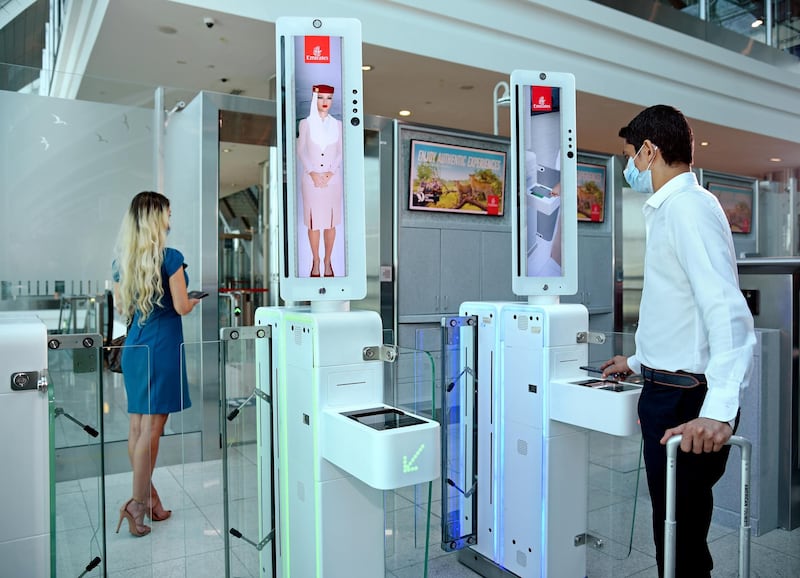   Passengers can use Emirates' new biometric pathways, which use a mix of facial and iris recognition, to check in, complete immigration and board their flights. Courtesy Emirates