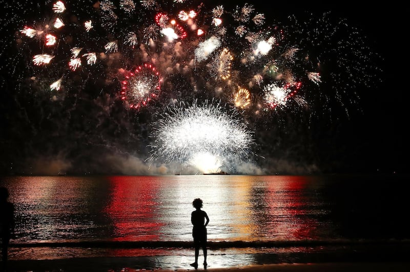 A young girl watches the  fireworks display during Territory Day celebrations at Mindil Beach in Darwin, Australia. Mark Kolbe / Getty Images