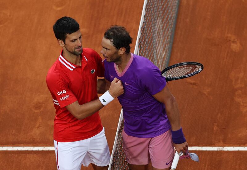 Rafael Nadal of Spain is congratulated by Novak Djokovic after the match. Getty