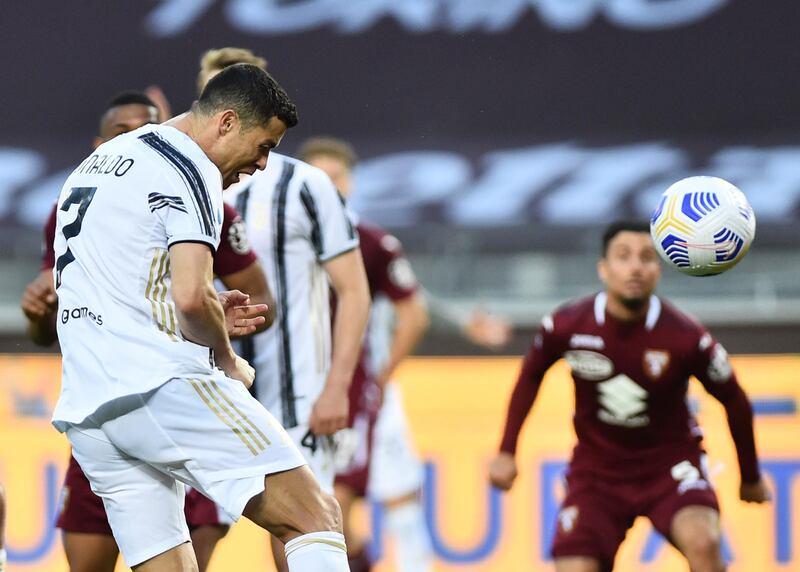 Juventus' Cristiano Ronaldo scores their second goal in a 2-2 draw with Torino. Reuters