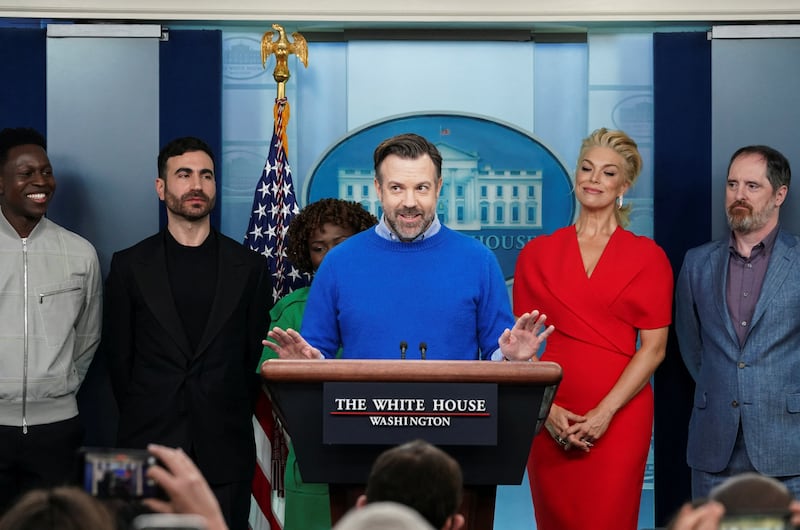 Jason Sudeikis takes to the White House podium as the cast of Ted Lasso joins the daily press briefing. Reuters