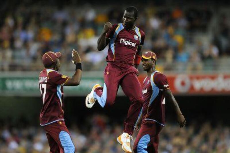 Darren Sammy, centre, has difficult examples to follow as captain of the West Indies. Matt Roberts / Getty Images