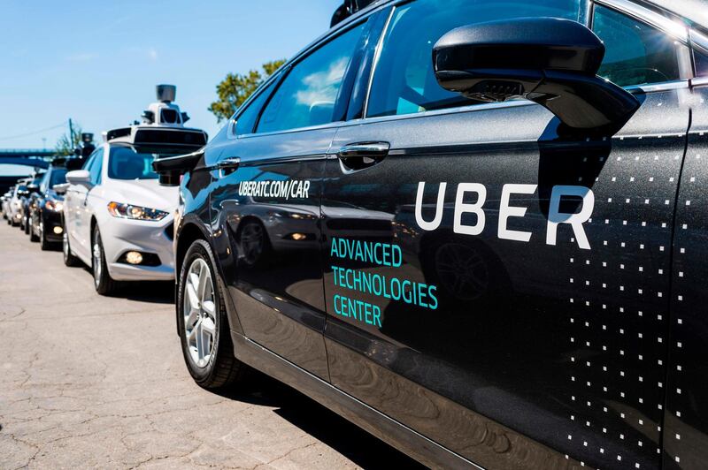 (FILES) In this file photo taken on September 13, 2016 Pilot models of the Uber self-driving car is displayed at the Uber Advanced Technologies Center in Pittsburgh, Pennsylvania. - August 27, 2018 Toyota will pump about $500 million into Uber as part of a deal to work together on mass-producing self-driving vehicles, the Japanese car giant said on Tuesday. (Photo by Angelo Merendino / AFP)