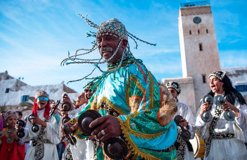 A Gnawa traditional group performs in the city of Essaouira to celebrate the decision of adding the Gnawa culture to Unesco's list of Intangible Cultural Heritage of Humanity. AFP