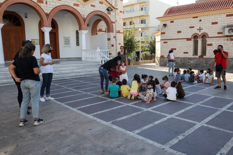 Pupils and their teachers in Heraklion gather in a square for safety following the earthquake. Photo: Reuters.