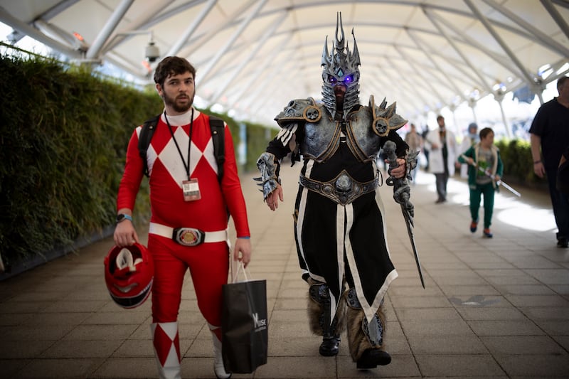 Cosplayers dressed as a Power Ranger and Sauron from 'The Lord of the Rings'. EPA