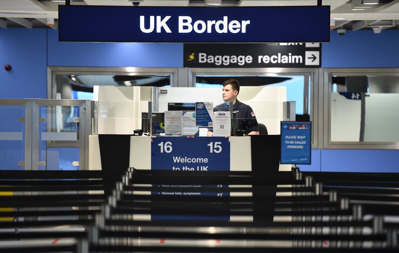 Passport control at an airport in the UK. PA