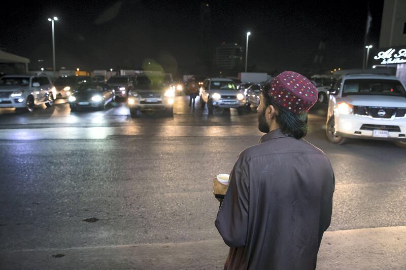 Ras Al Khaimah, United Arab Emirates - September 20th, 2017: People collect there tea from Nena Tea. A traditional fishing neighbourhood in Old RAK has been transformed by karak coffee and tea shops that have popped up in the last two years. Wednesday, September 20th, 2017, Old RAK, Ras Al Khaimah. Chris Whiteoak / The National