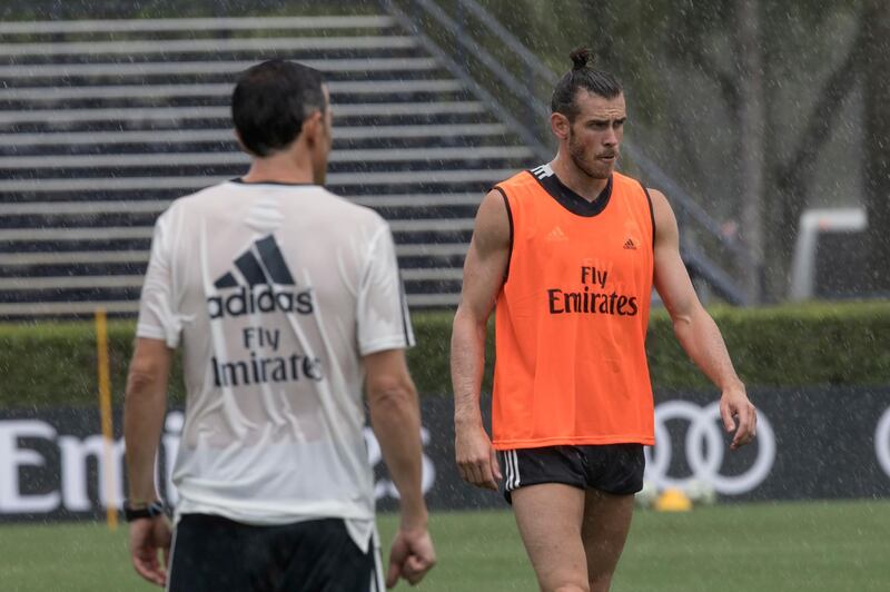 Real Madrid winger Gareth Bale, right, trains at Florida International University in Miami. AP Photo