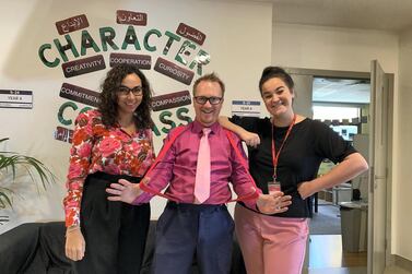 Teachers at Ranches Primary School Andi Price, (C), Nerys Hughes, (L), and Emma Synnott (R), wore pink to school on Thursdays before the Covid-19 pandemic. Courtesy: Andi Price