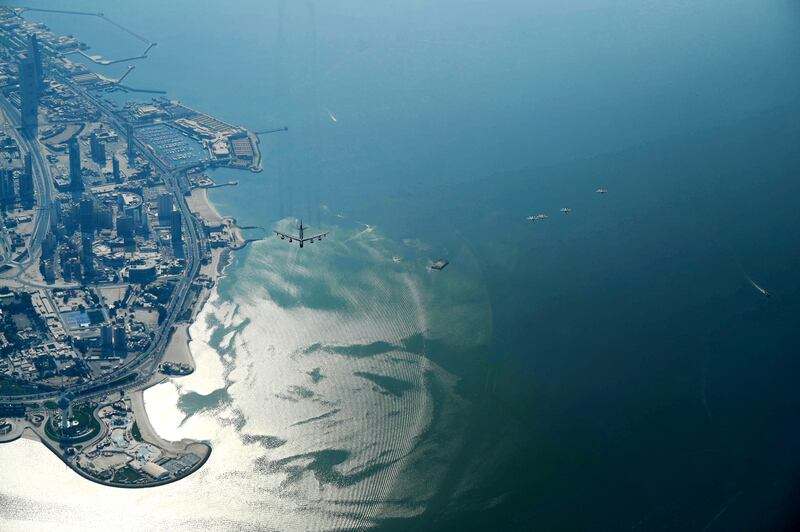 This photo released by the U. S.  Air Force shows a B-52H Stratofortress assigned to the 5th Bomb Wing, Minot Air Force Base, North Dakota, flying over Kuwait City, Kuwait, on Sunday, Sept.  4, 2022.  The Air Force flew the mission Sunday amid tensions with Iran in the wider region as negotiations over Tehran's tattered nuclear deal with world powers hang in the balance.  (Staff Sgt.  Charles Fultz/U. S.  Air Force via AP)