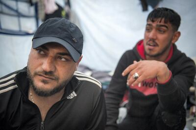 Mohamed and Khaled from Syria inside their tent in Moria camp