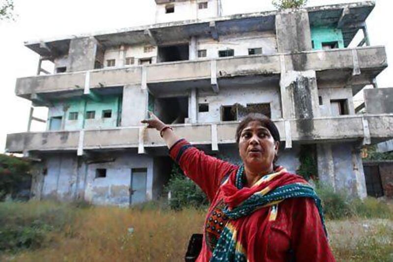 Rupa Dara Mody witness and victim showing her flat  in Gulberg society in Ahmedabad city of Gujarat state in India. Rupa Dara Mody lost her son Ajar who was 13 years old at the time of th 2002 riots.