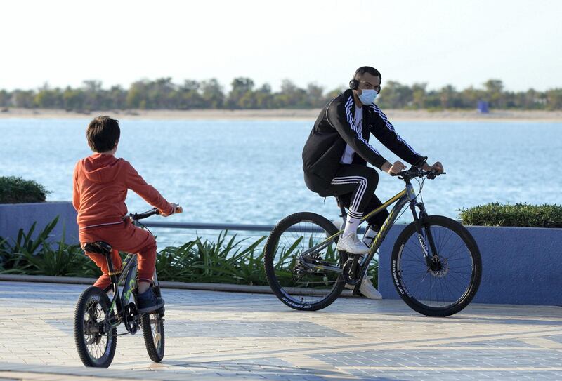 Abu Dhabi, United Arab Emirates, January 5, 2021.  Abu Dhabi residents wearing warm clothing to ptotect themselves from the chilly weather.
Victor Besa/The National
Section:  Weather/Standalone