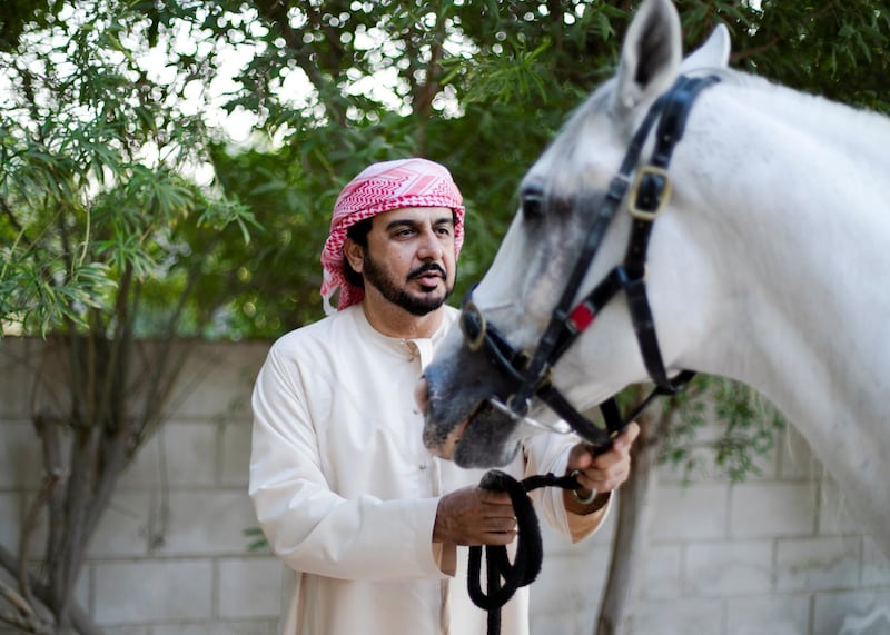 DUBAI, UNITED ARAB EMIRATES. 17 OCTOBER 2019. 
Horse owner and breeder, Khalid Khalifa Al Naboodah with the stallion Af Maquam Alezz, in Al Awir stables.
(Photo: Reem Mohammed/The National)

Reporter:
Section: