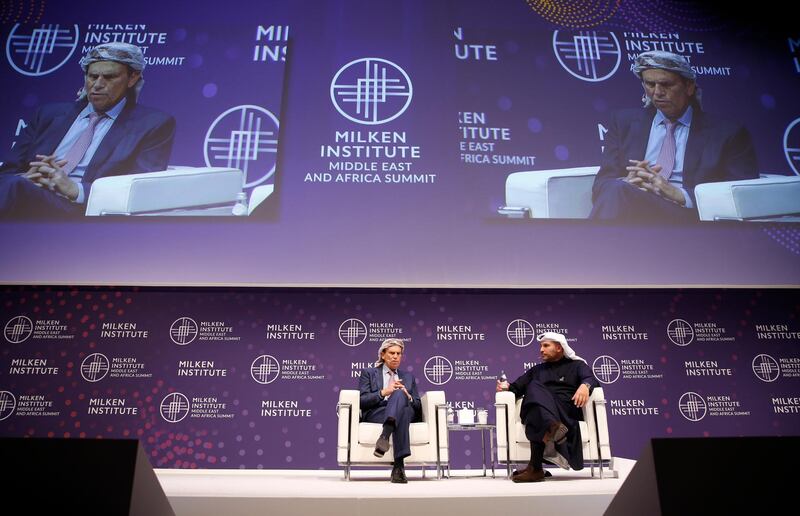 Michael Milken, Chairman of the Milken Institute, and Khaldoon Al Mubarak, right, chief executive of Mubadala Investment Company, speak during the 2020 Milken Institute Middle East and Africa Summit at St Regis Saadiyat Island Resort in Abu Dhabi.  EPA