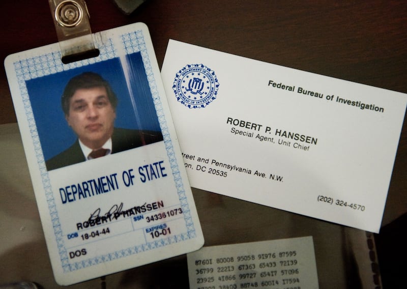 The ID and business card of former FBI agent Robert Hanssen on display at the FBI Academy in Quantico, Virginia. AFP