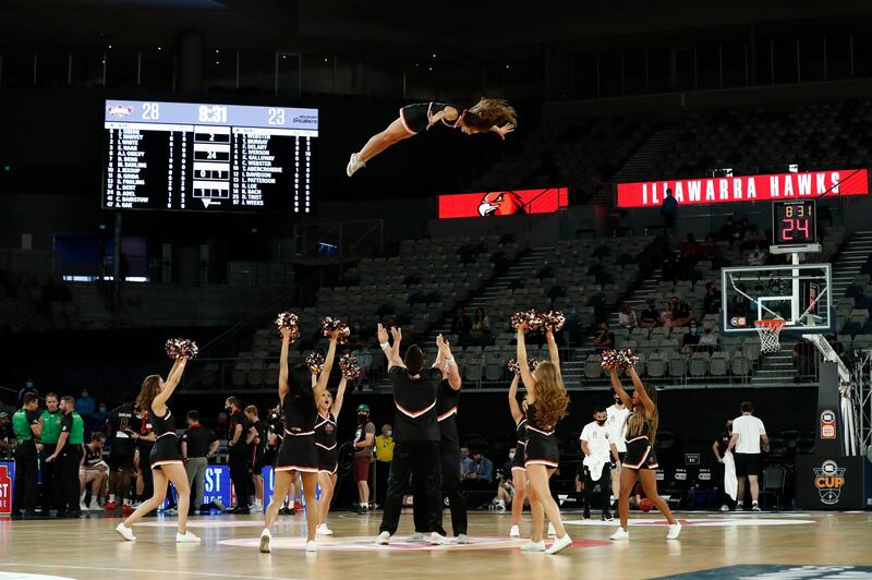 Cheerleaders perform during the half-time break of the NBL Cup match between the Illawarra Hawks and New Zealand Breakers basketball teams at John Cain Arena in Melbourne, Australia. Getty