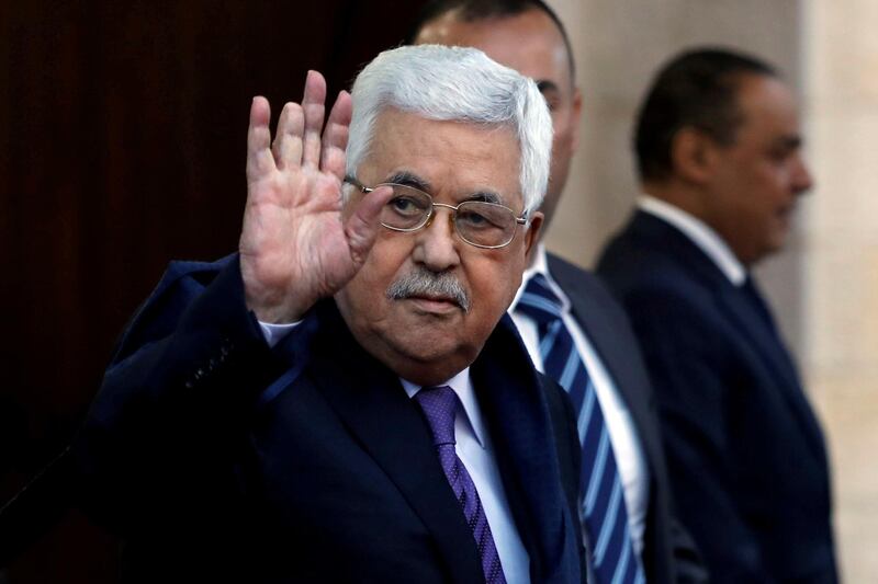 FILE PHOTO - Palestinian President Mahmoud Abbas waves in Ramallah, in the occupied West Bank May 1, 2018. Picture taken May 1, 2018. REUTERS/Mohamad Torokman/File Photo