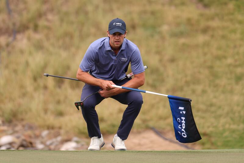 Continental Europe's Thomas Detry lines up a putt on the second hole during his 2&1 loss to Matt Wallace. Getty